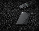 Formuler Z mini receiver and BT1 remote on dark stones