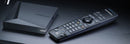 Formuler Z11 Pro Max receiver and BT1 remote on a desk